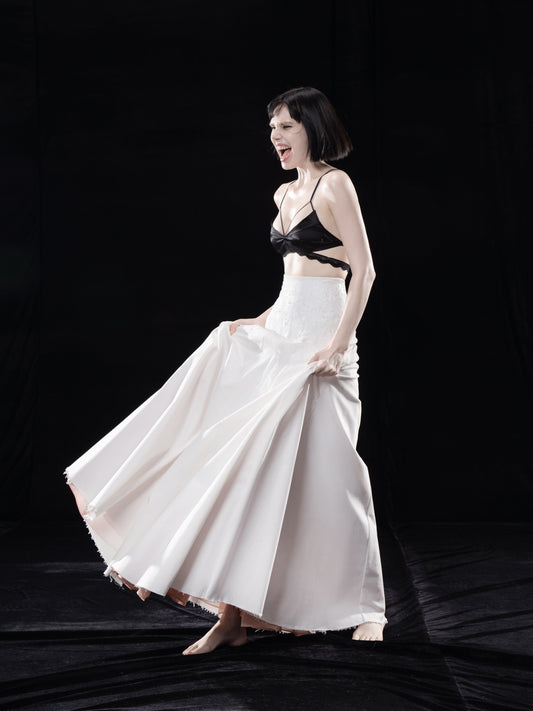 TEXTURED LONG VOLUMINOUS FLARED SKIRT WITH RAW EDGES