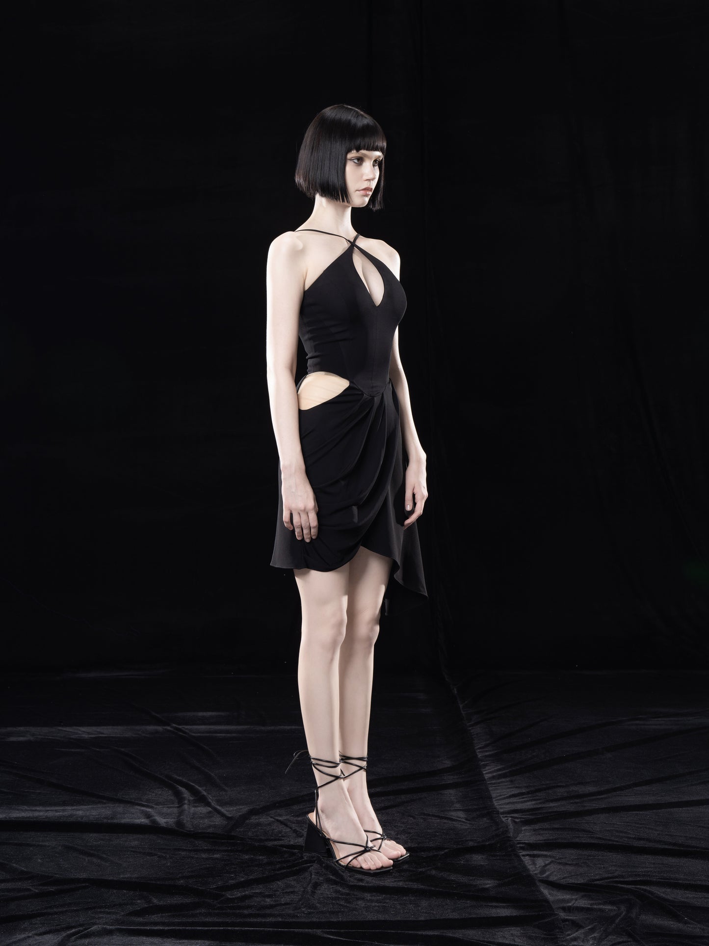 BLACK HALTERNNECK DRAPED DRESS WITH CUT-OUTS