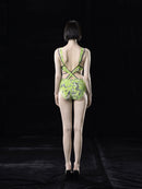 NEON GREEN PRINTED SWIMSUIT WITH STRAPS AND CUT-OUTS