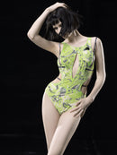 NEON GREEN PRINTED SWIMSUIT WITH STRAPS AND CUT-OUTS